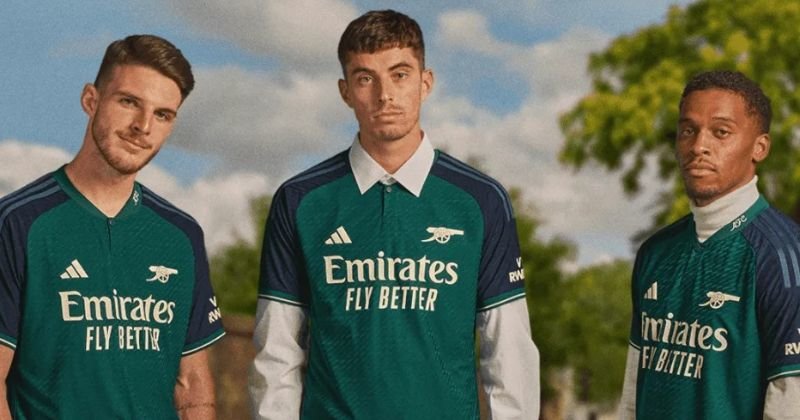 players wearing arsenal 2023-24 third shirt in teal and navy